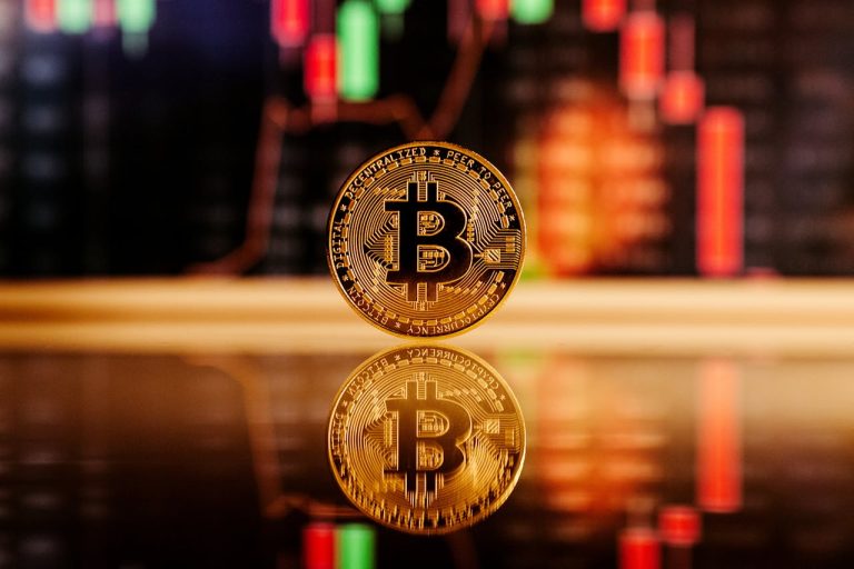 bitcoin with candle sticks at the background
